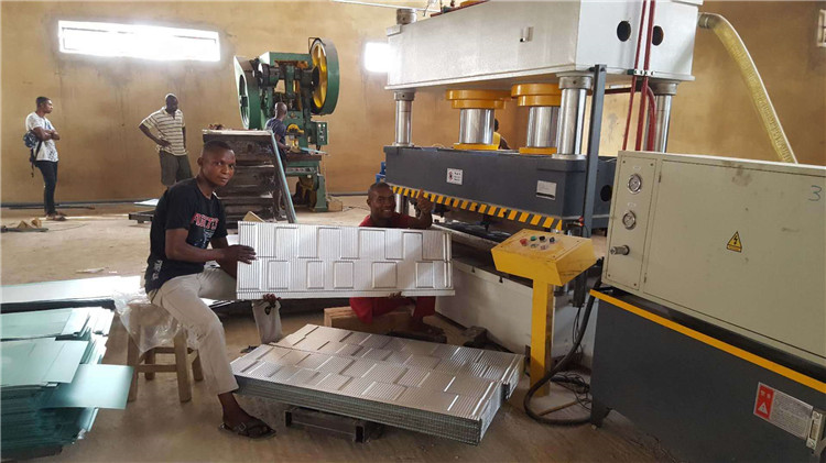 Stone coated roof tile making machine